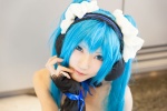 blue_hair bodice cosplay fingerless_gloves gloves hairband hatsune_miku headphones ribbon_tie tatsuki_(ii) twintails vocaloid rating:Safe score:0 user:pixymisa