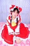 cosplay hairbow hakurei_reimu hanausagi_manyu jumper miko touhou rating:Safe score:0 user:LittleSweetLoli