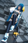 bikini blue_hair boots choker cosplay detached_sleeves dizzy guilty_gear hairbow pantyhose swimsuit tachibana_remika tail thighhighs wings rating:Safe score:0 user:nil!