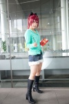 boots cosplay hairbow pocky puella_magi_madoka_magica red_hair sakura_kyouko shorts skizaki sweatshirt rating:Safe score:2 user:pixymisa
