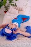 bed blue_hair bodysuit buyara cosplay hair_ribbons headband klan_klein macross macross_frontier twintails rating:Safe score:0 user:nil!