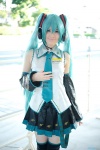 aqua_hair blouse cosplay detached_sleeves hatsune_miku headset pleated_skirt popuri skirt thighhighs tie twintails vocaloid zettai_ryouiki rating:Safe score:2 user:nil!