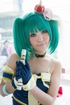armband beads bodice braid choker cosplay crown gloves green_hair hime-chin macross macross_frontier microphone ranka_lee red_eyes twintails rating:Safe score:0 user:pixymisa