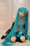 aqua_hair blouse cosplay detached_sleeves hatsune_miku mero pleated_skirt skirt thighhighs tie twintails vocaloid zettai_ryouiki rating:Safe score:1 user:nil!