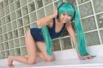 aqua_hair barefoot cosplay hatsune_miku headset necoco necosmo one-piece_swimsuit swimsuit twintails vocaloid rating:Safe score:2 user:nil!