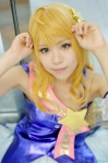 blonde_hair cosplay hoshii_miki idolmaster pleated_skirt shimotsuki_sato skirt tank_top rating:Safe score:0 user:nil!