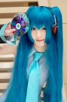 aqua_hair cosplay default_costume detached_sleeves hatsune_miku headset hina tie twintails vocaloid rating:Safe score:0 user:nil!