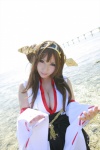 beach cleavage cosplay detached_sleeves hairband kantai_collection kimono kongou_(kantai_collection) ocean pleated_skirt saku skirt rating:Safe score:0 user:nil!