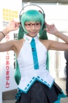 aqua_hair cosplay glasses hatsune_miku headphones necoco pleated_skirt skirt sleeveless_blouse tie twintails vocaloid rating:Safe score:0 user:pixymisa