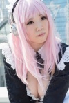 ainya apron cleavage cosplay dress hairband headphones maid maid_uniform nitro_super_sonic pink_eyes pink_hair super_soniko rating:Safe score:0 user:pixymisa