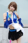 blouse cosplay detached_sleeves final_fantasy final_fantasy_x final_fantasy_x-2 microphone miniskirt nao_(cosplayer) skirt yuna rating:Safe score:1 user:nil!