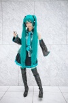 aqua_hair blouse boots cosplay detached_sleeves hatsune_miku headset microphone mineo_kana pleated_skirt skirt thigh_boots thighhighs tie twintails vocaloid zettai_ryouiki rating:Safe score:1 user:nil!