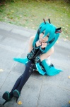 aice aqua_hair cosplay default_costume detached_sleeves hatsune_miku headset pleated_skirt skirt thighhighs tie twintails vocaloid zettai_ryouiki rating:Safe score:1 user:nil!