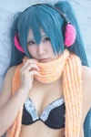 bikini_top blue_hair cleavage cosplay ear_muffs hatsune_miku headset momoka_(ii) scarf swimsuit twintails vocaloid rating:Safe score:0 user:nil!