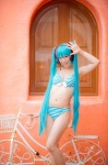 aqua_hair bikini cleavage cosplay hatsune_miku headset mashiro_yuki project_diva swimsuit twintails vocaloid rating:Safe score:1 user:nil!