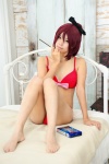 bed bikini cleavage cosplay hairbow neko puella_magi_madoka_magica red_hair sakura_kyouko swimsuit rating:Safe score:2 user:nil!