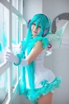 aqua_hair cosplay dress elbow_gloves gloves hatsune_miku head_wings madoka_chami pantyhose project_diva_2nd thighhighs twintails vocaloid wings zettai_ryouiki rating:Safe score:2 user:xkaras