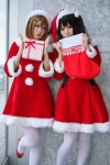 cosplay hair_clips hayashida_azu hirasawa_yui k-on! nakano_azusa nana_(iv) pantyhose santa_costume stocking_cap twintails white_legwear rating:Safe score:2 user:pixymisa