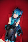 blouse blue_hair cosplay detached_sleeves haruka hatsune_miku headset pleated_skirt skirt sleeveless_blouse thighhighs twintails vocaloid zettai_ryouiki rating:Safe score:0 user:nil!