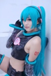 aira aqua_hair boots cosplay croptop elbow_gloves gloves hair_ribbon hatsune_miku headset project_diva shorts sleeveless thigh_boots thighhighs twintails vocaloid rating:Safe score:0 user:pixymisa