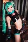 aqua_hair black_legwear cosplay croptop detached_sleeves elbow_gloves gloves hatsune_miku headset necoco necosmo project_diva shorts twintails vocaloid rating:Safe score:1 user:nil!